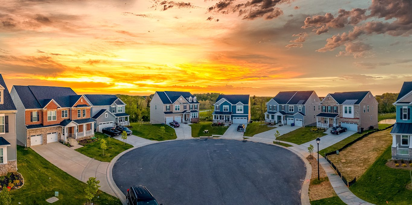 Cul de sac classic dead end street surrounded by luxury two stor